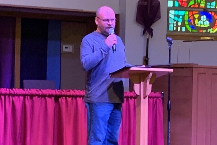 Chad Hoke, president of the Milwood Neighborhood Watch Association, speaks at the association's first in-person community meeting since early 2020. The meeting was held on Tuesday evening (March 22, 2022) at the Milwood United Methodist Church.