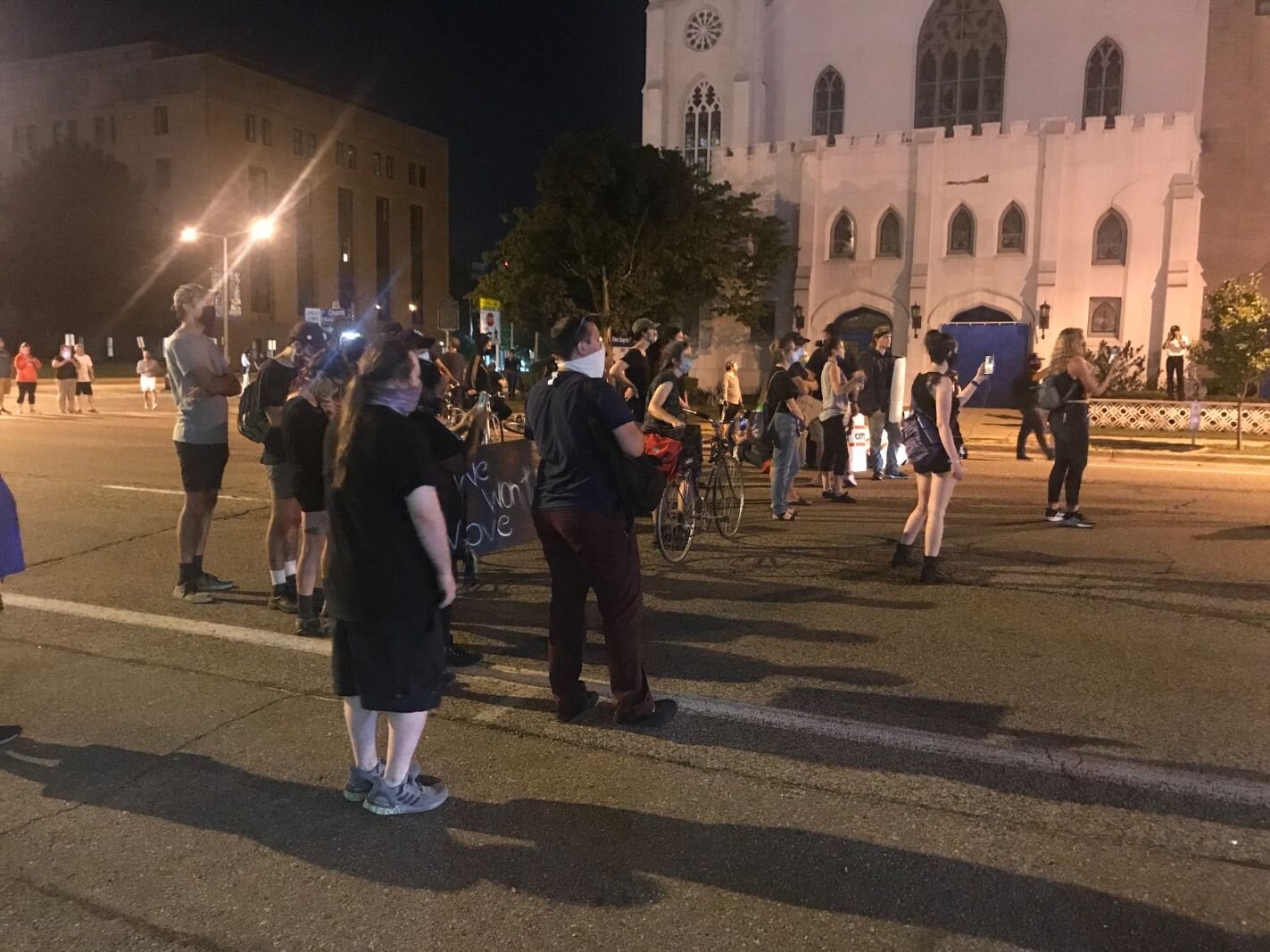 Young people who were disappointed with the Kalamazoo Public Safety response to Saturday’s Proud Boys protest block traffic that night on Michigan Avenue just east of Park Street. 