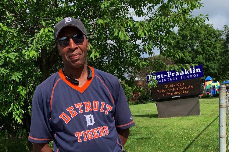 Crossing guard Lamount Horton welcomed everyone as he helped students through a very busy intersection.