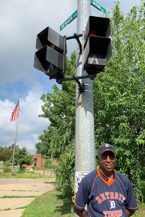 At Main Street and Newark Avenue in front of Post Franklin Elementary School crossing guard Lamount Horton is a neighborly presense. 