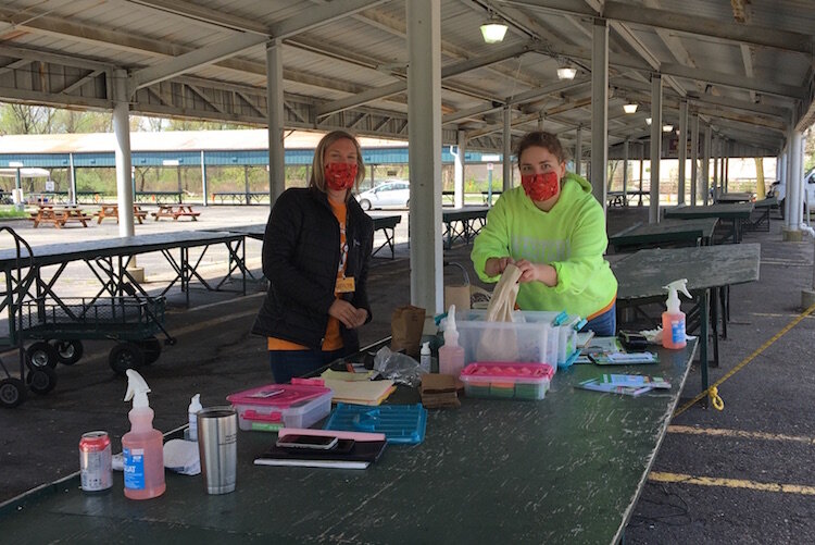 Market Manager Katelyn Bekken and PFC Marketing Manager Katie Justa at a Saturday morning Farmers maket.