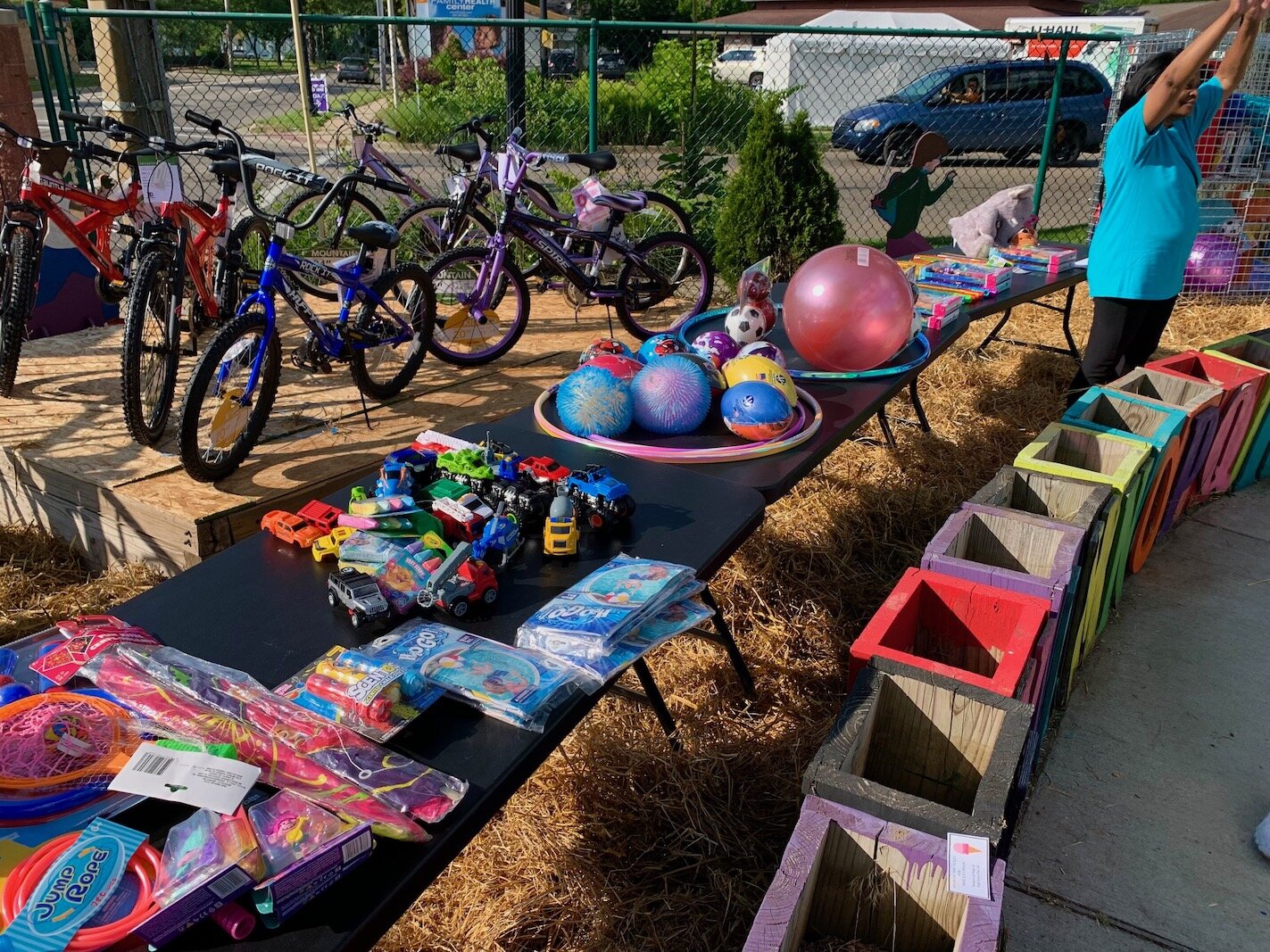 Bicycles and toys were given to youngsters during the Northside Association for Community Development's annual National Night Out on Tuesday in the pocket park behind the organization's 612 N. Park St. offices.