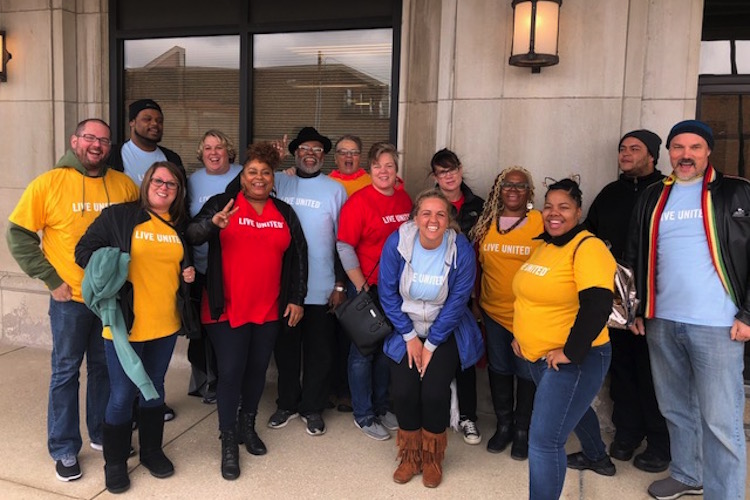 CARES Staff volunteering for United Way of Southwest Michigan in Benton Harbor by Doing food distribution for Feed America.