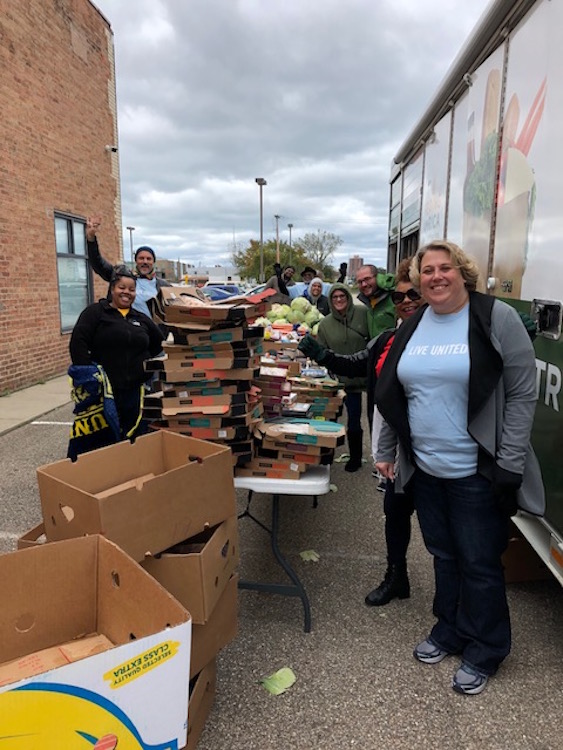 CARES Staff volunteering for United Way of Southwest Michigan in Benton Harbor by Doing food distribution for Feed America.