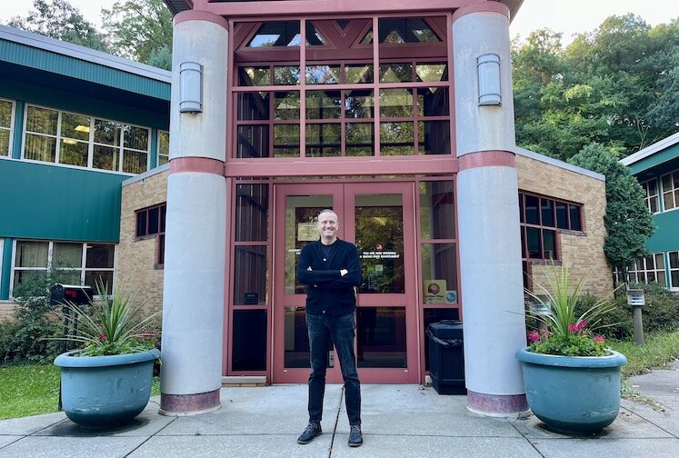 Chris Slater in front of the Elizabeth Upjohn Community Healing Centers, the Stadium Drive office of Community Healing Centers