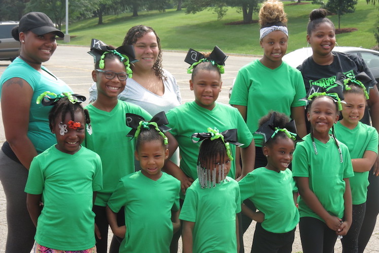 In addition to football, Kalamazoo Wolverines sponsors competitive cheerleading teams.