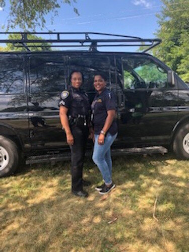 Corporal Shawn O’Bryant, left, and Kelly Dillman, the Community Outreach Liaison for BCPD at a PAL and New Level Sports event earlier in 2019.