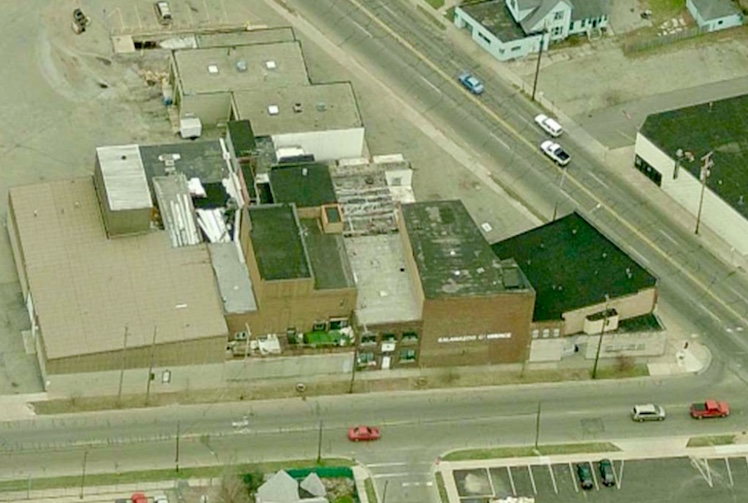 The compromised state of the dilapidated Kalamazoo Creamery Company building, off the southeast corner of Lake and Portage streets, can be seen in this image taken as the structure was demolished in 2011.