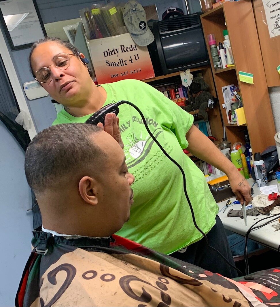 Roshaun Heltzel worries that her business, Above & Beyond Unisex Salon at 305 E. Stockbridge Ave., will be negatively impacted if a pod community for the homeless is established across the street.
