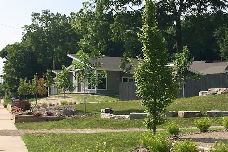 The first three of seven single-family residences has been built, sold and are occupied in the 1500 block of E. Michigan Ave. as part of the Eastside Gateway Project. A fourth house is all about complete and has a potential buyer.