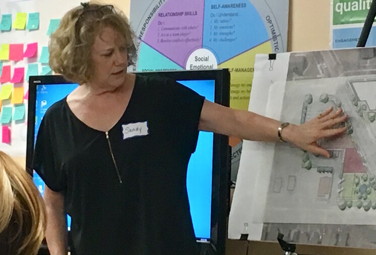 Sandy Bliesener, of O’Boyle, Cowell, Blalock & Associates, talks about creating a vision for the 1600 block of East Main Street.