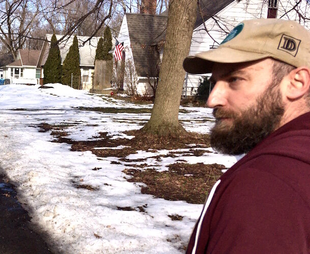 Andrew Richmond takes pride in some of the exterior fix-it work that helped him get to know some of his neighbors a few years ago. 