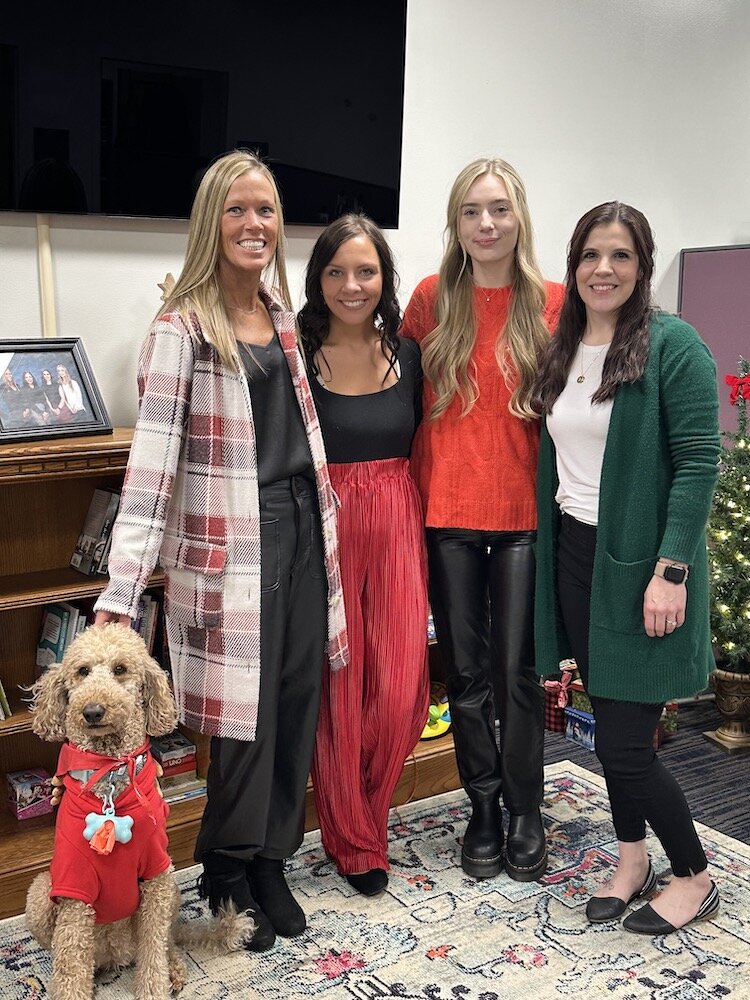 L-R: Journey, Kelly Jo Fournier, Jena Hess, Kelsey Kipp, Marlee Giese. Fournier is the Victim Services Coordinator and Hess, Kipp, and Giese are her team members