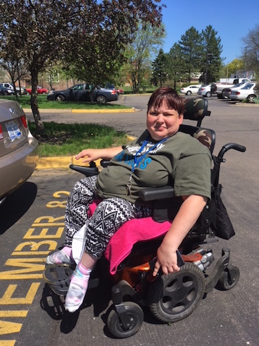 Lisa Persons, a resident of Washington Square Senior Co-op Apartments who uses an electric wheelchair, says sometimes she has to go into the road to avoid dangerous sidewalks.  