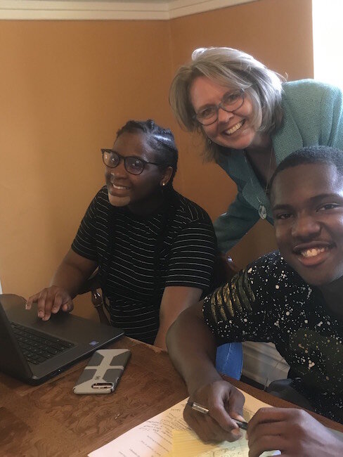 Theresa Coty O'Neil works with youth from Peace House as part of the On the Ground community correspondent academy.