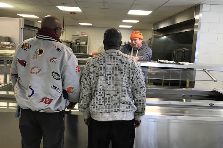 Dinner is served at the Salvation Army in Battle Creek.