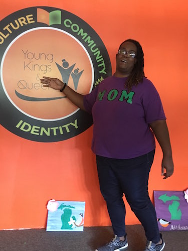 Takisha Johnson in the colorfully decorated headquarters of Young Kings and Queens.