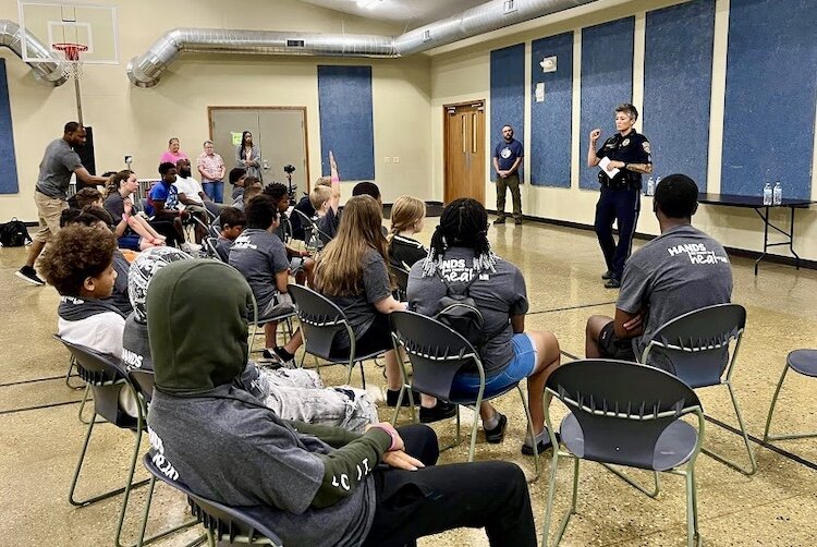 A Kalamazoo Public Safety officer is shown leading an information session during Urban Alliance’s Life Camp last summer.
