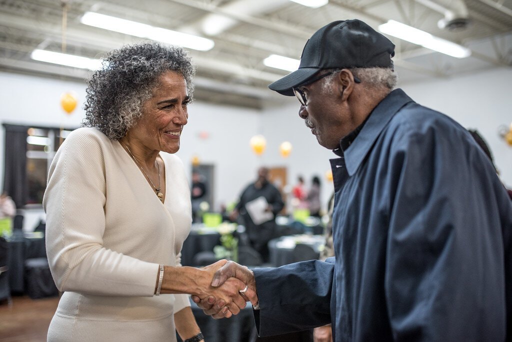 Elizabeth Washington, new executive director of the NACD, meets neighborhood residents at a Friday, March 1, 2024 open house.