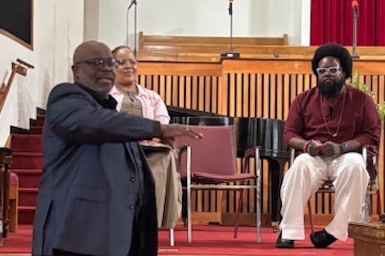 Chief Egunwale Amusan, at left, with Dr. Nakia Baylis, President and CEO of the Village Network, center, and Dr. L.E. Johnson, Senior Director for Inclusion and Diversity with the Village Network, at right.