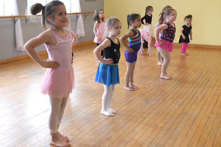 Students participate in a dance class at In His Steps studio