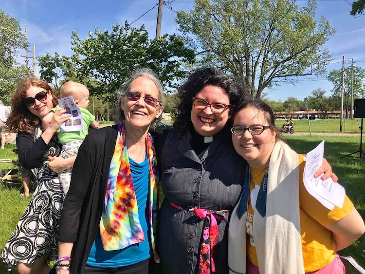 Rev. Rachel Lonberg of People's Church (with baby), Susan Fisher of Hearth & Grove Fellowship, Pastor Sarah Schmidt-Lee of First Congregational, and Rabbi Simone Schicker of Temple B’nai Israel at a Pride Interfaith Service.