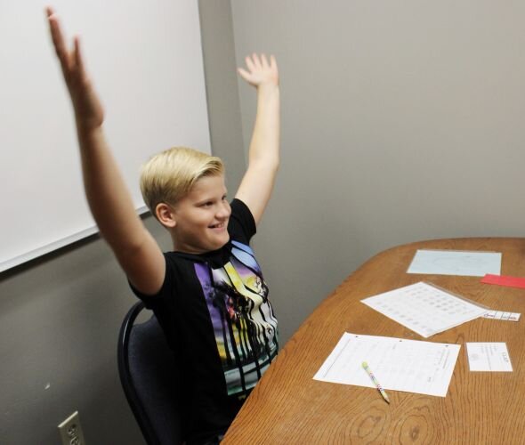 Jack celebrates after a learning success.