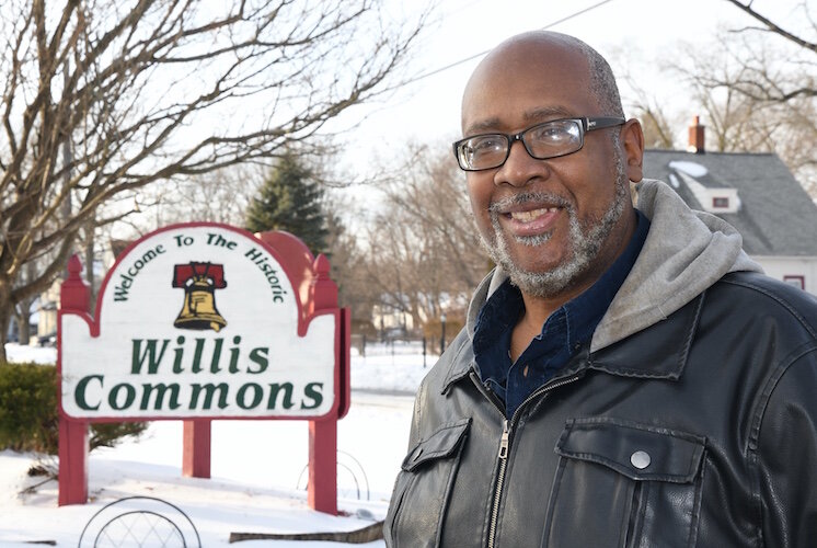 Count Laws stands by the sign commemorating Willis Commons.