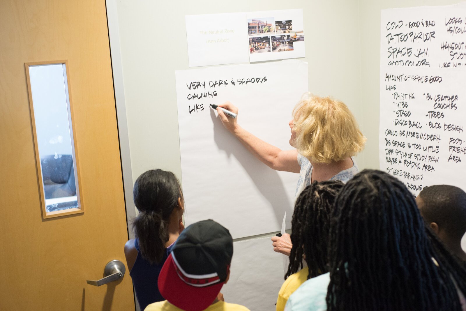 Collecting ideas at a gathering of youth who came together this summer to offer their input on what a youth and teen facility in their community should look like.