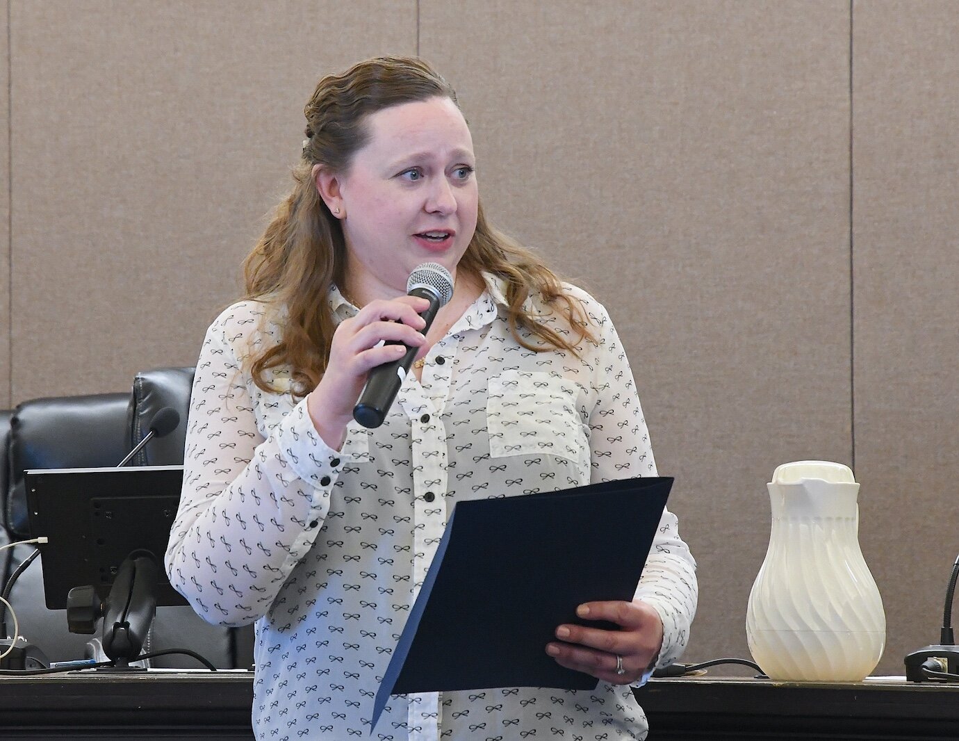 Kaytee Faris, Battle Creek City Commission member and Vice Mayor, talks prior to reading a proclamation at a recent meeting.