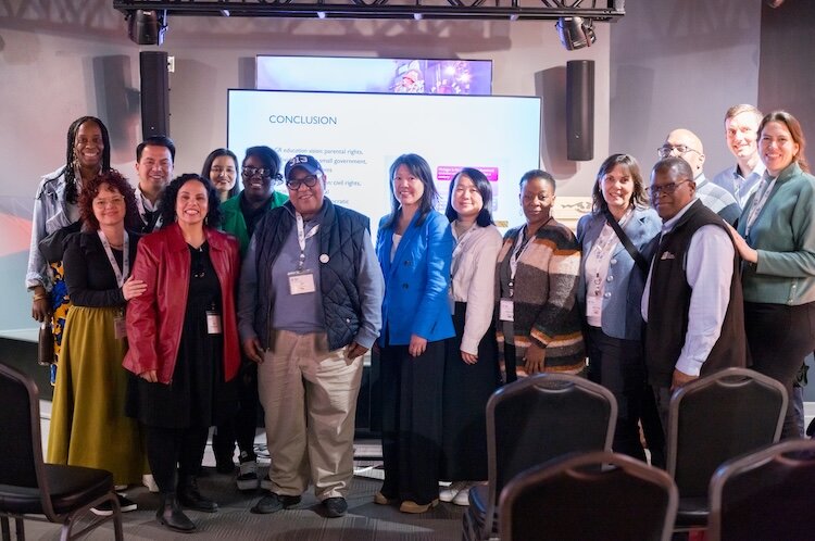 Devon Wilson poses with Michigan-based fellows in the Community Leadership Network class three.