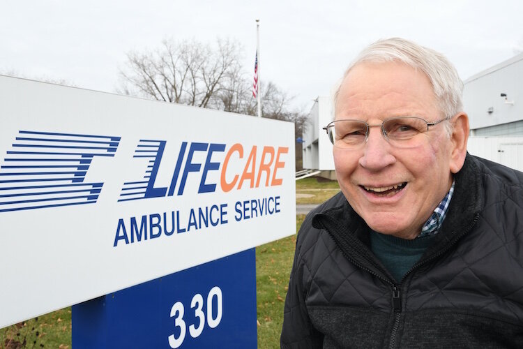 Larry Anderson outside the LifeCare Ambulance Services offices 