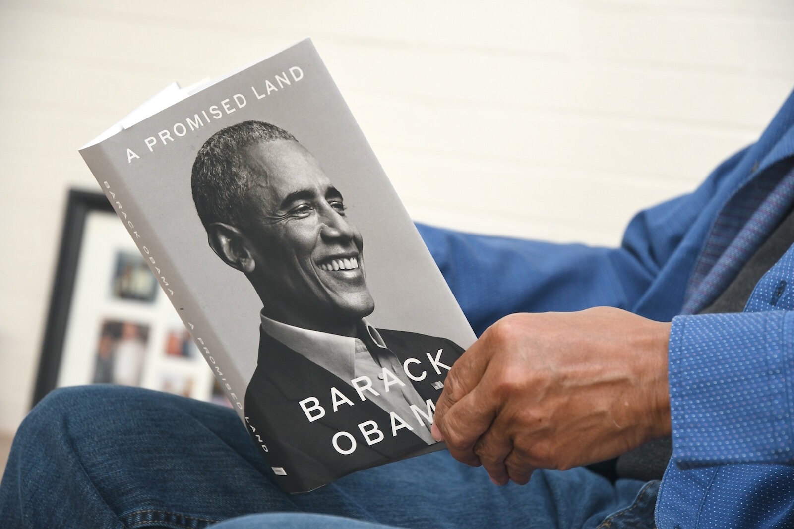 Leonard Harris is reading Barack Obama’s “A Promised Land.”