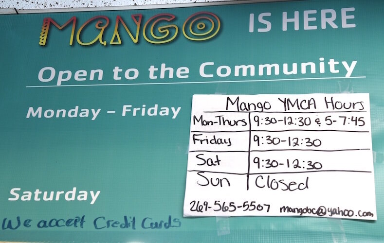 Sign over Mango Healthy Fruit and Food at the YMCA.