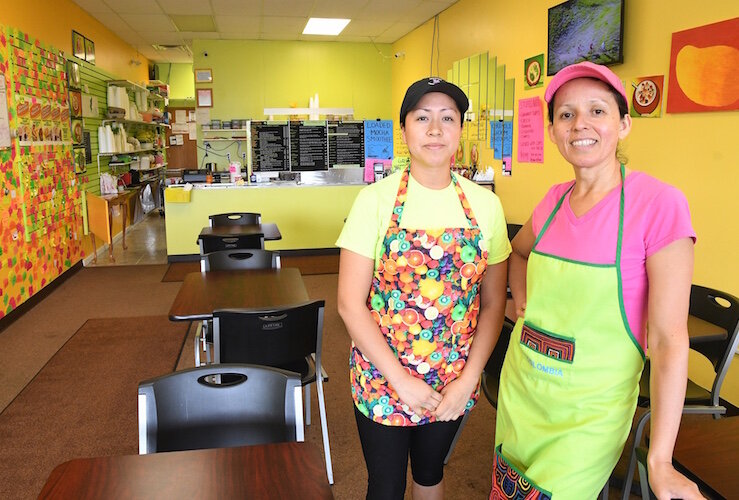 Eugenia Macias and Sagario Gerrero inside Mango Healthy Fruit and Food at Columbia and Helmer.