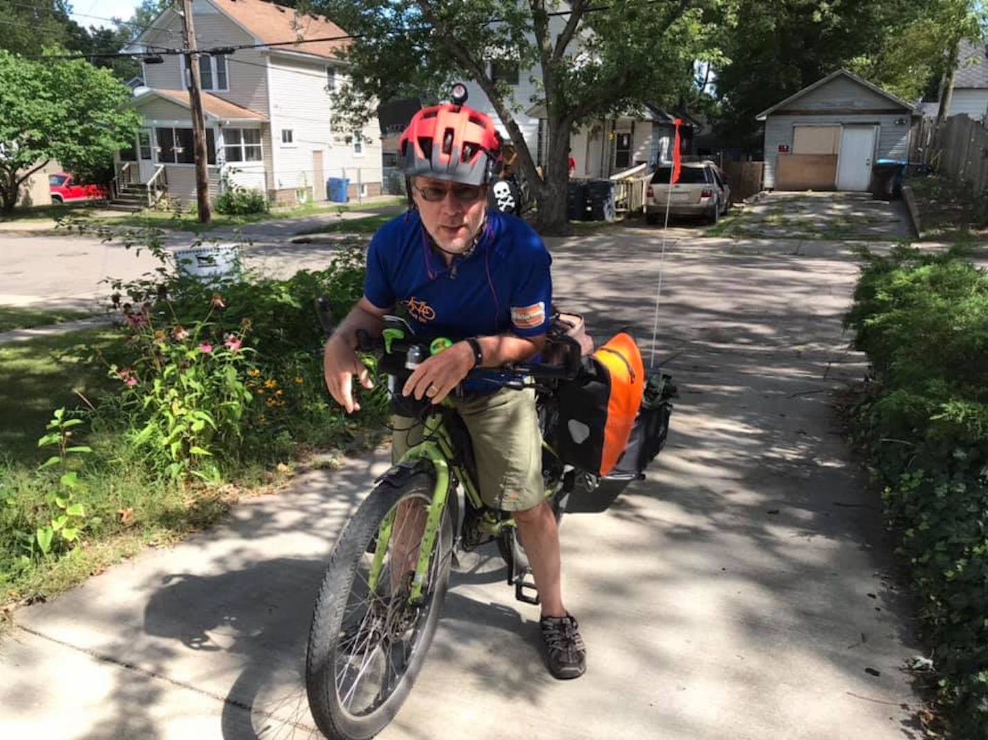 Mark Wedel the moment he arrives home from his 13 day 556 mile bike tour of the hilly part of Michigan. 