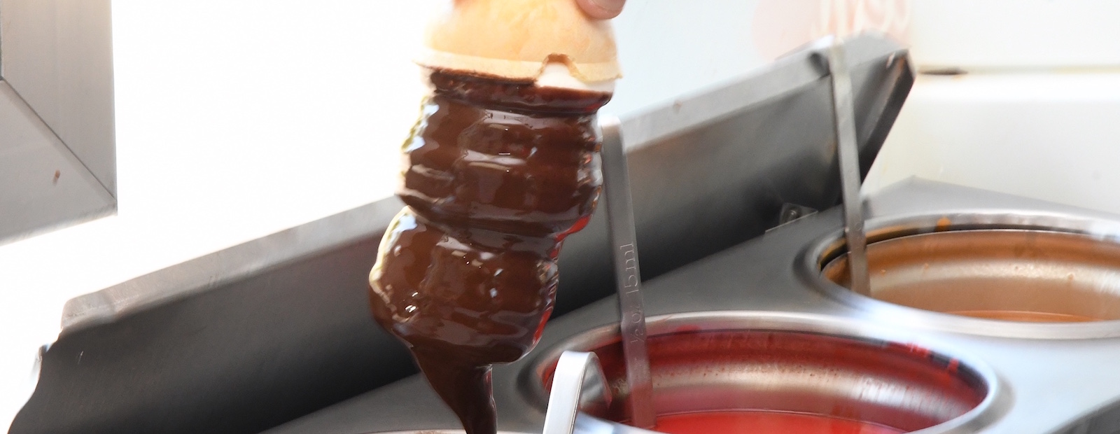 A cone dipped in chocolate