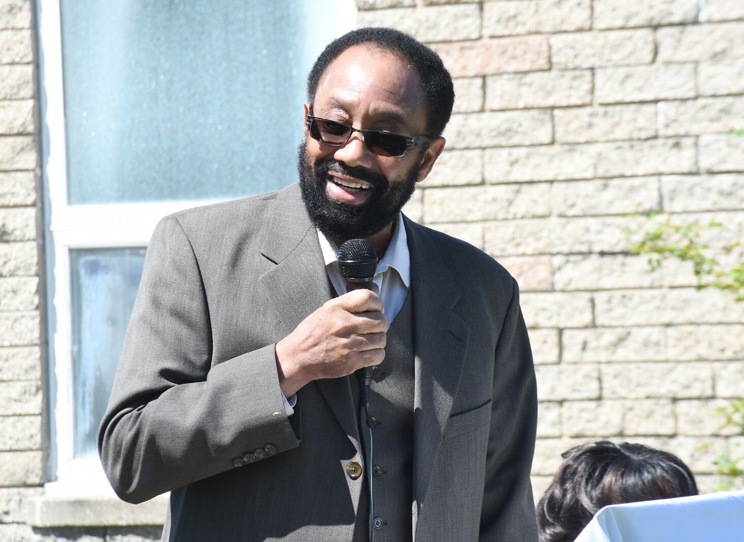 Carey Whitfield, President of Battle Creek’s NAACP, gives remarks on May 8, during the day of the unveiling of Honorary Mayor Maude Bristol-Perry Avenue.
