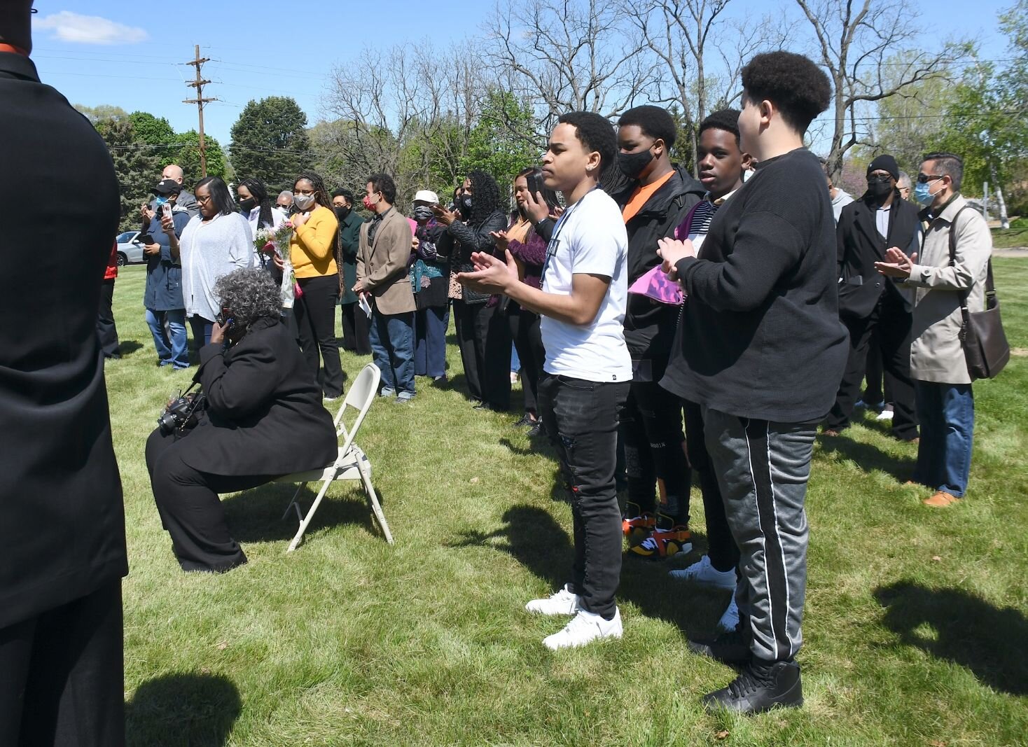 Family and friends of Maude Bristol-Perry watch the festivities s on May 8, during the day of the unveiling of Honorary Mayor Maude Bristol-Perry Avenue.