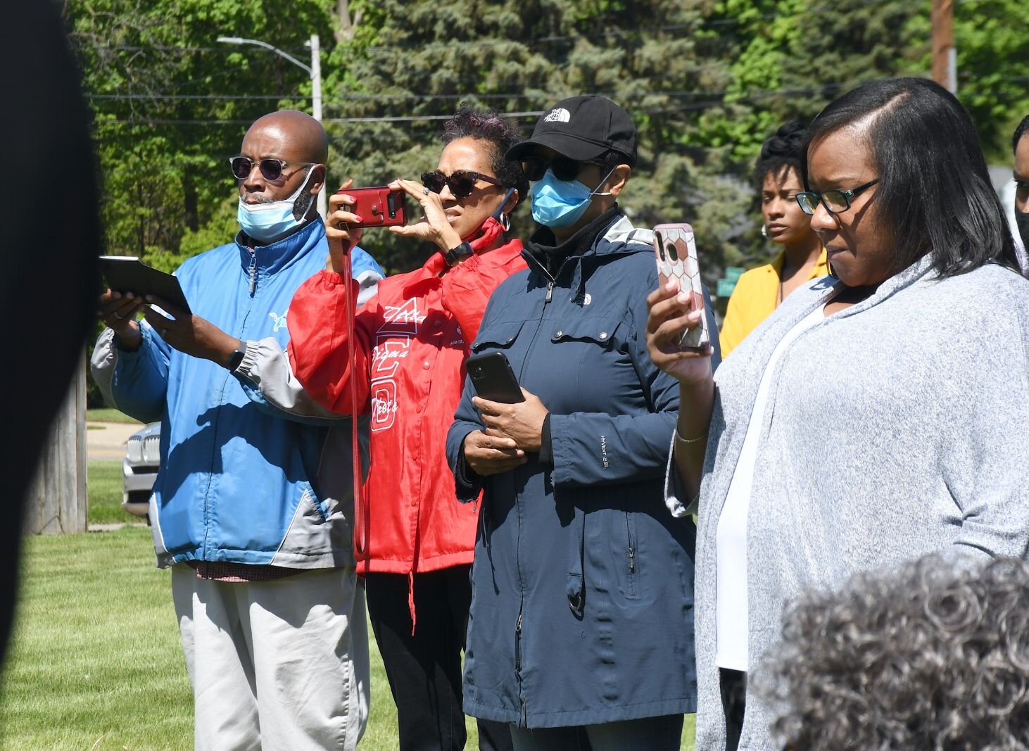 Family and friends of Maude Bristol-Perry watch the festivities s on May 8, during the day of the unveiling of Honorary Mayor Maude Bristol-Perry Avenue.