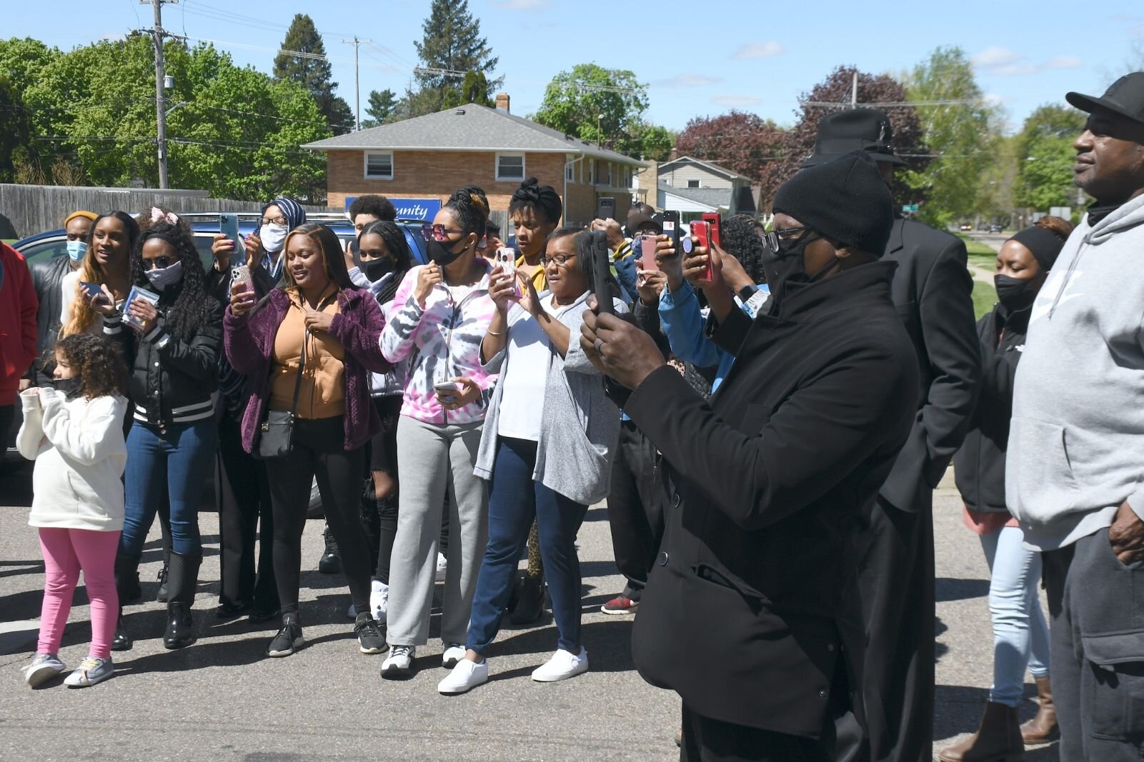 Family and friends of Maude Bristol-Perry watch the festivities s on May 8, during the day of the unveiling of Honorary Mayor Maude Bristol-Perry Avenue.