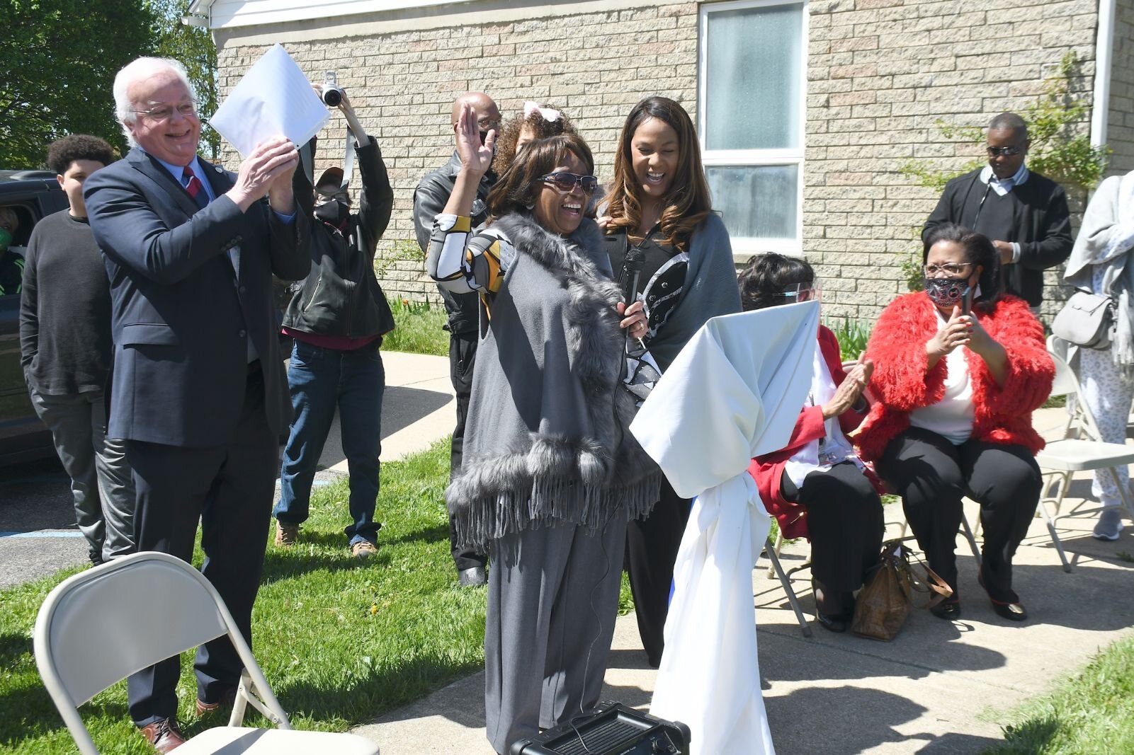 Maude Bristol-Perry talks with family and friends on May 8, during the day of the unveiling of Honorary Mayor Maude Bristol- Perry Avenue.
