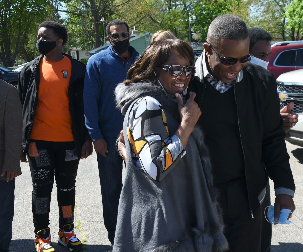 Maude Bristol-Perry walks with Pastor Chris McCoy on May 8, during the day of the unveiling of Honorary Mayor Maude Bristol- Perry Avenue.