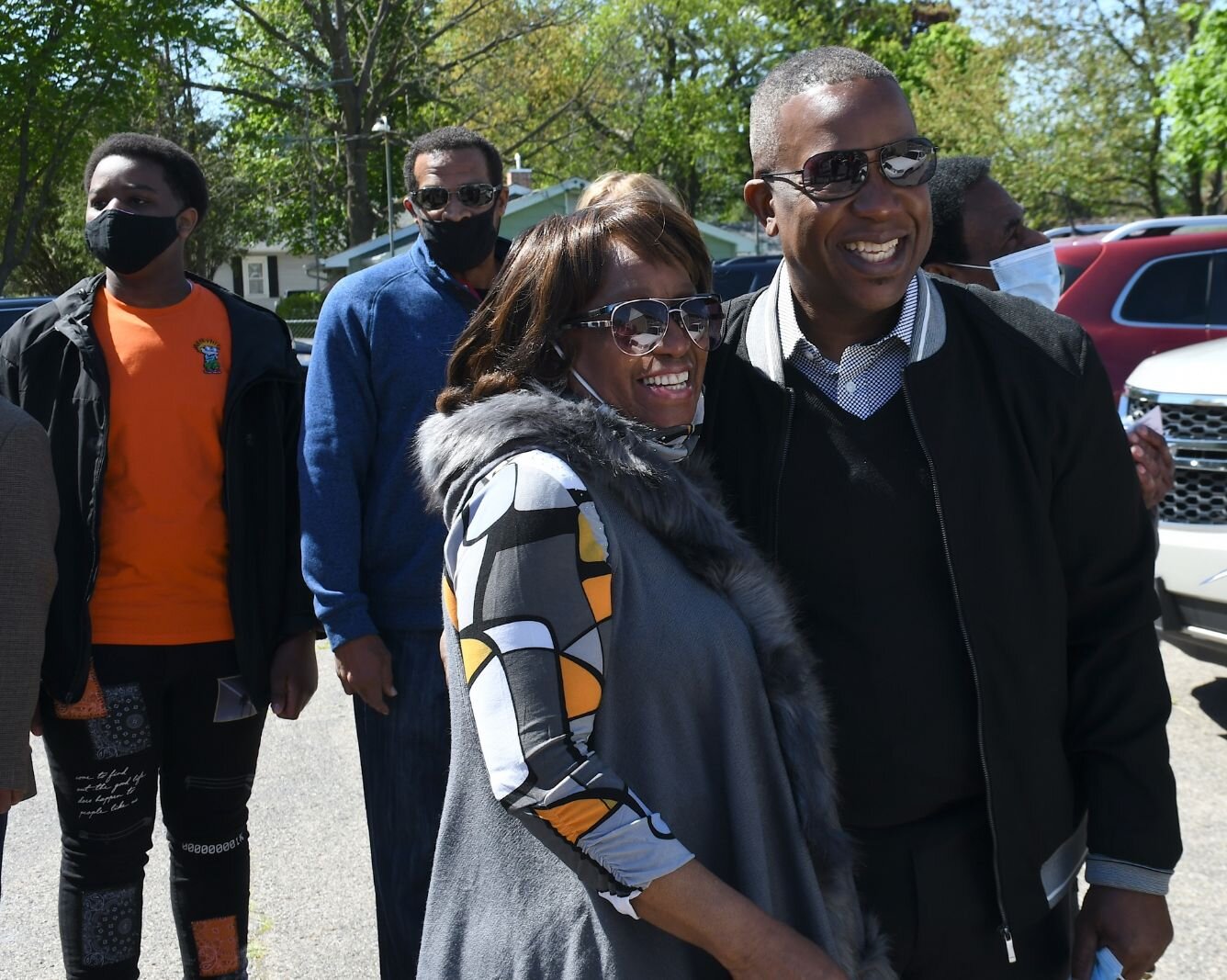 Maude Bristol-Perry walks with Pastor Chris McCoy on May 8, during the day of the unveiling of Honorary Mayor Maude Bristol- Perry Avenue.