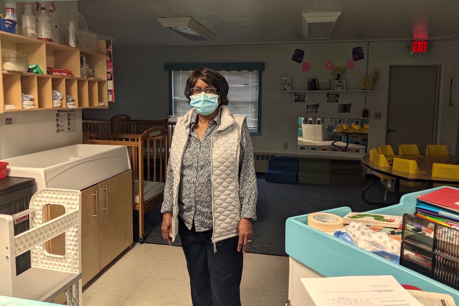 Maude Bristol-Perry, owner of Sugar and Spice Childcare Center, stands in an area used to care for infants.