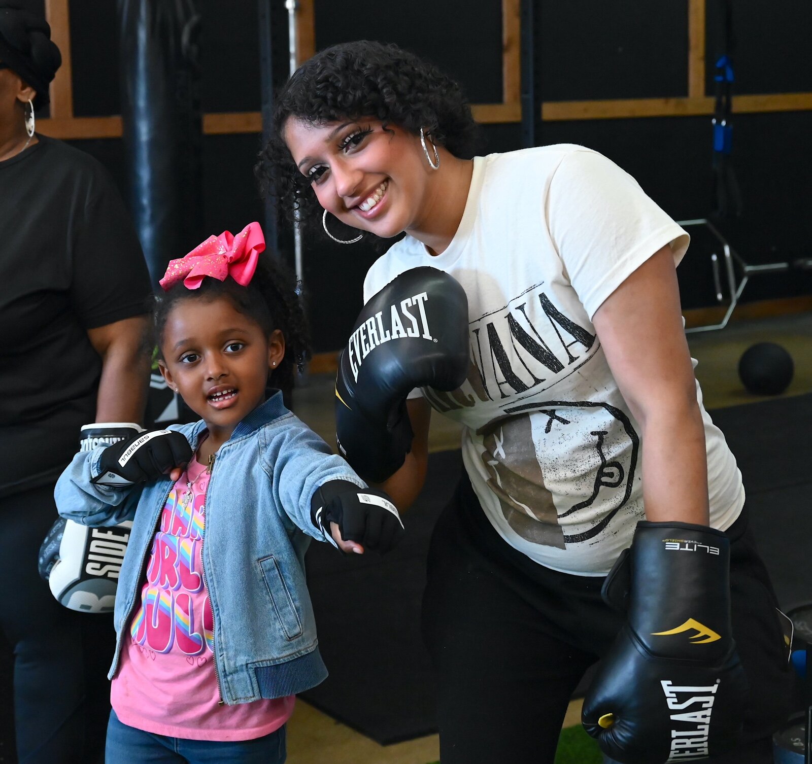 Ariana Davids poses with one of her daughters, Amiyah Williams, during the “Mother & Daughter” Boxing Expo.