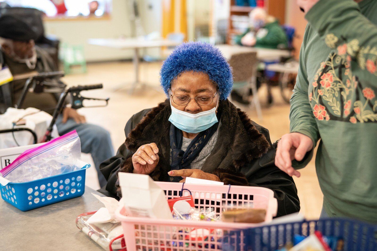 A participant works on an arts and crafts project. 