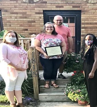 The Milwood Neighborhood Watch Association plans to applaud the efforts of local people. Shown here are Amanda and Chad Hoke, winners of the neighborhood’s first annual Curb Appeal Contest.