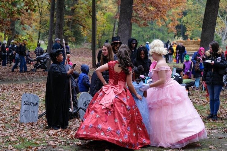 Youngsters are shown enjoying last year’s Halloween Forest in Milham Park.
