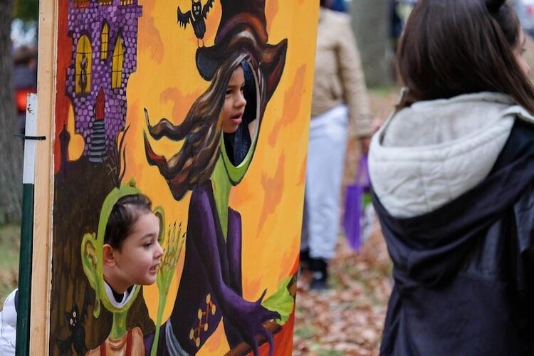 Youngsters are shown enjoying last year’s Halloween Forest in Milham Park.